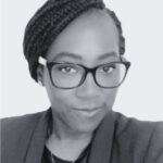 Vicky Bamishile screenshot, black and white filter.